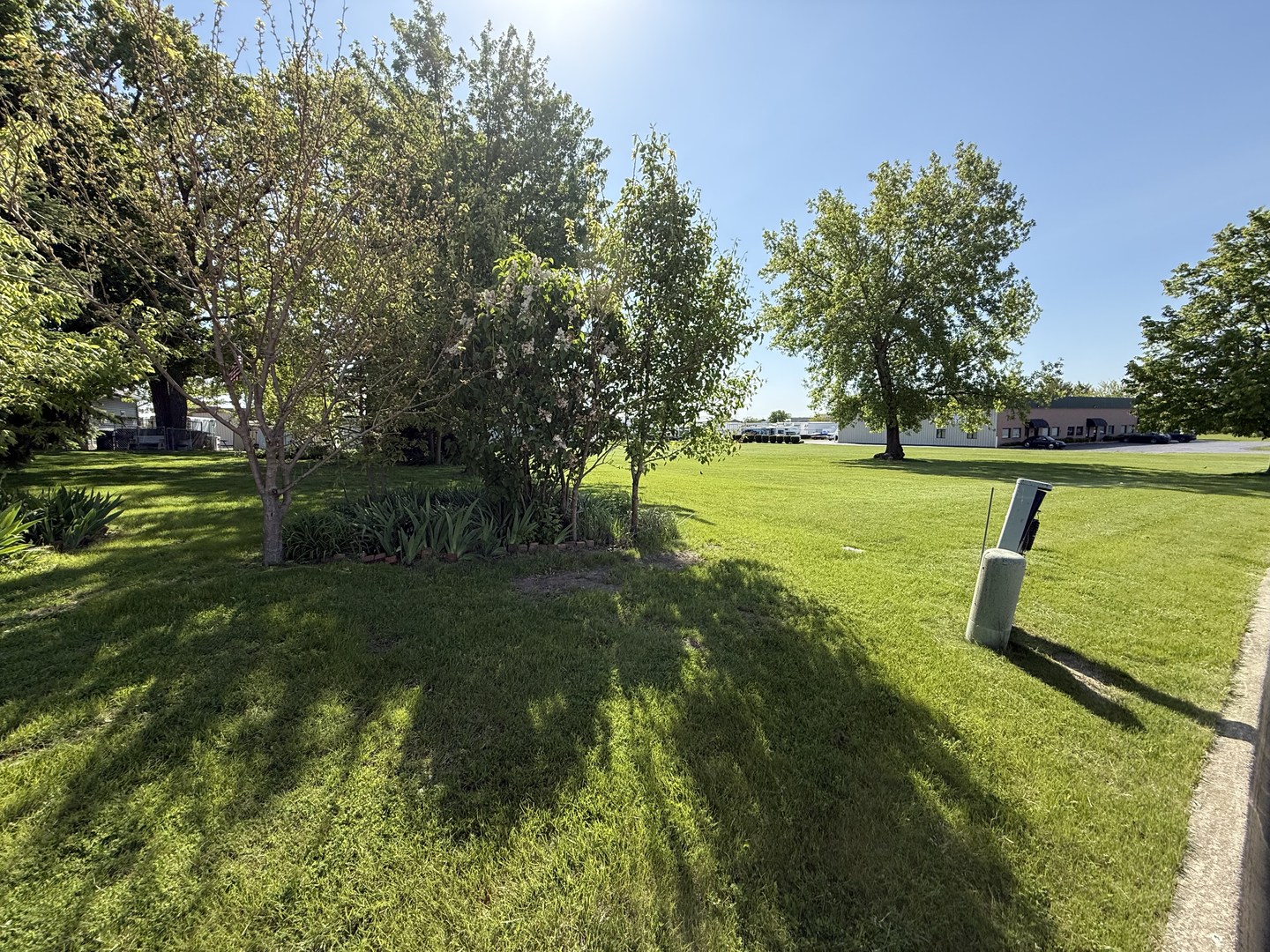 25501 West Wolfs Road Plainfield, IL 60585 - Photo 19 of 22 a view of a golf course with a lake