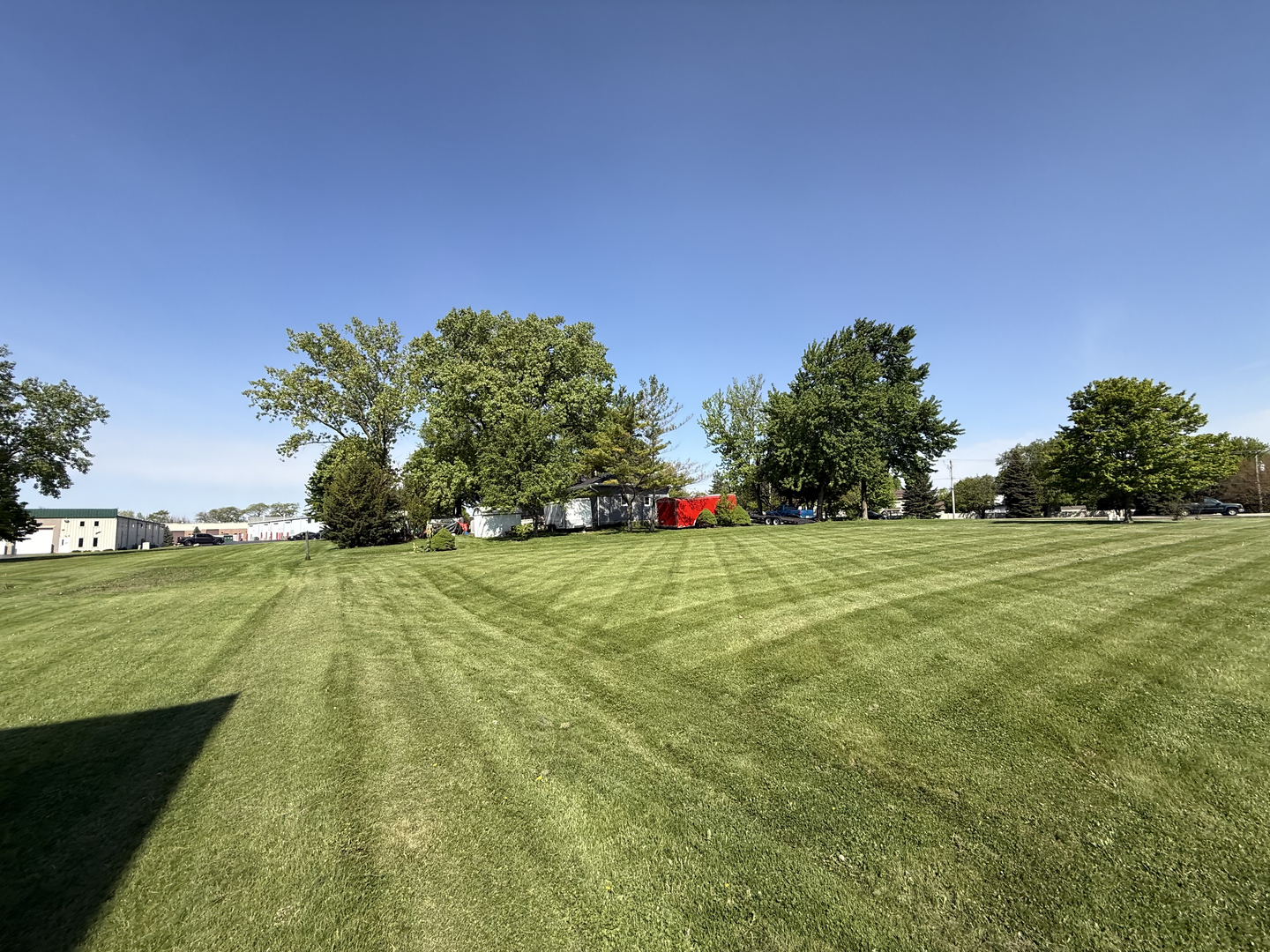 25501 West Wolfs Road Plainfield, IL 60585 - Photo 6 of 22 a view of a field with large trees