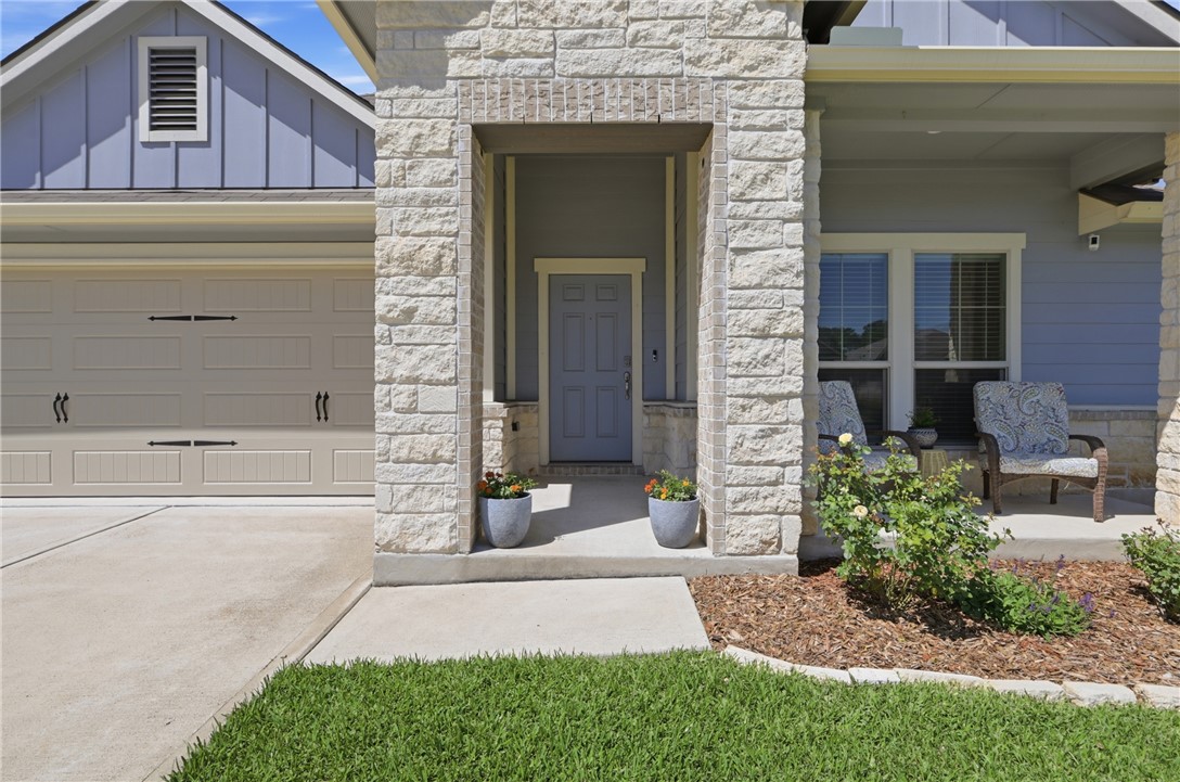 1943 Thorndyke Lane Bryan, TX 77807 - Photo 3 of 28 The landscaping and front porch... are you kidding me!