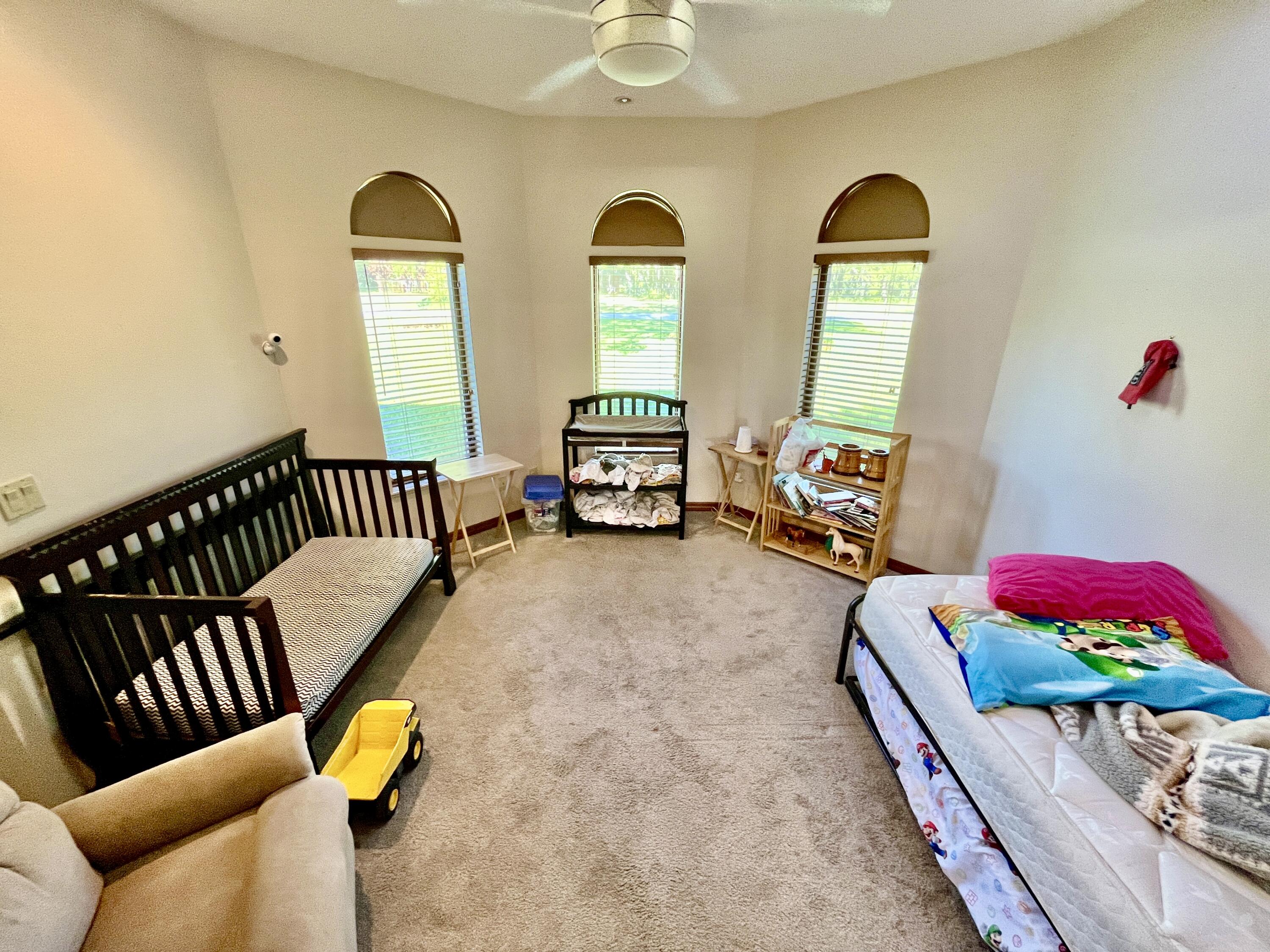 3046 North Bowden Road Avon Park, FL 33825 - Photo 13 of 41 a living room with furniture and a potted plant