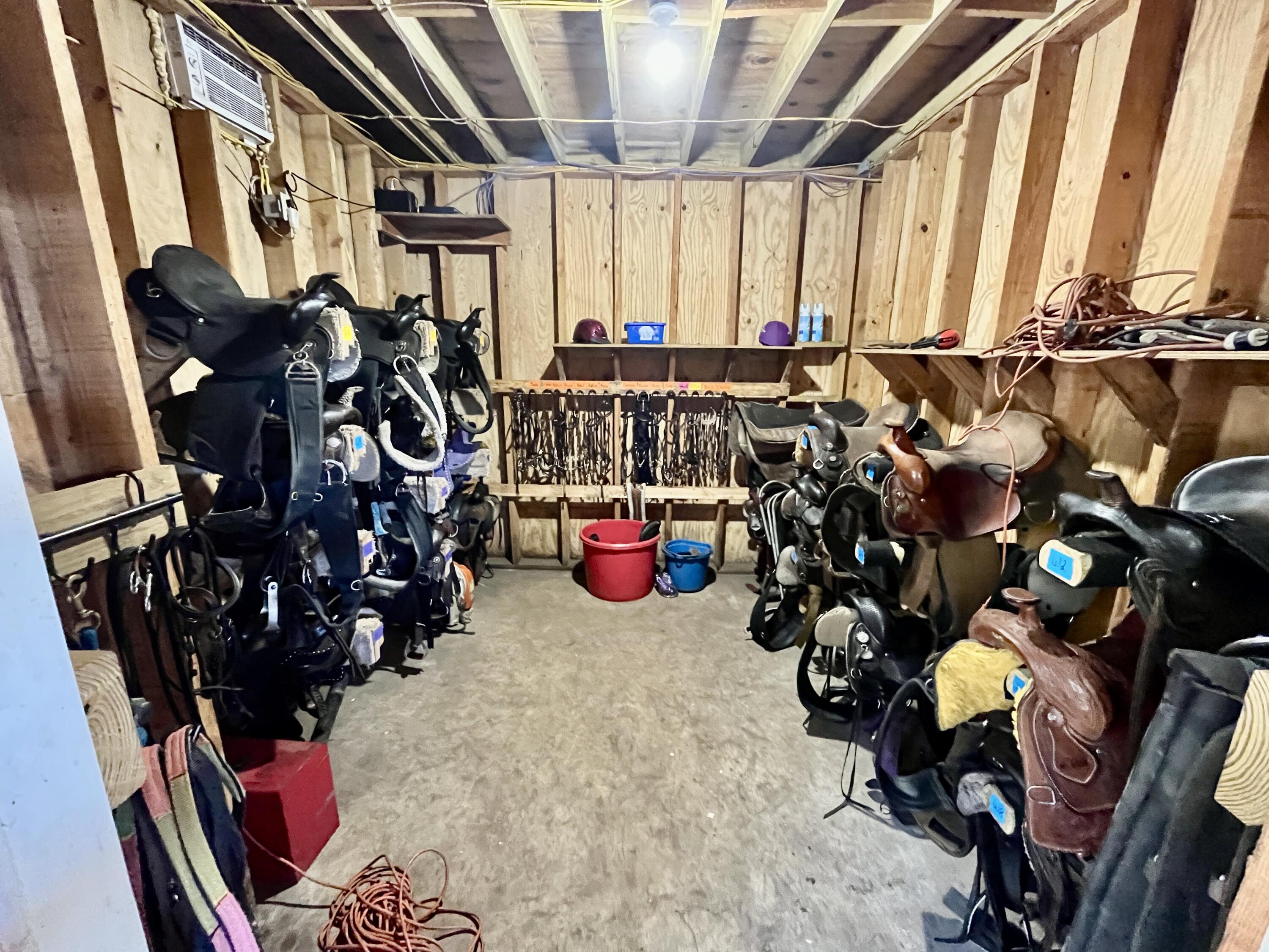 3046 North Bowden Road Avon Park, FL 33825 - Photo 37 of 41 a view of a storage room with shoes
