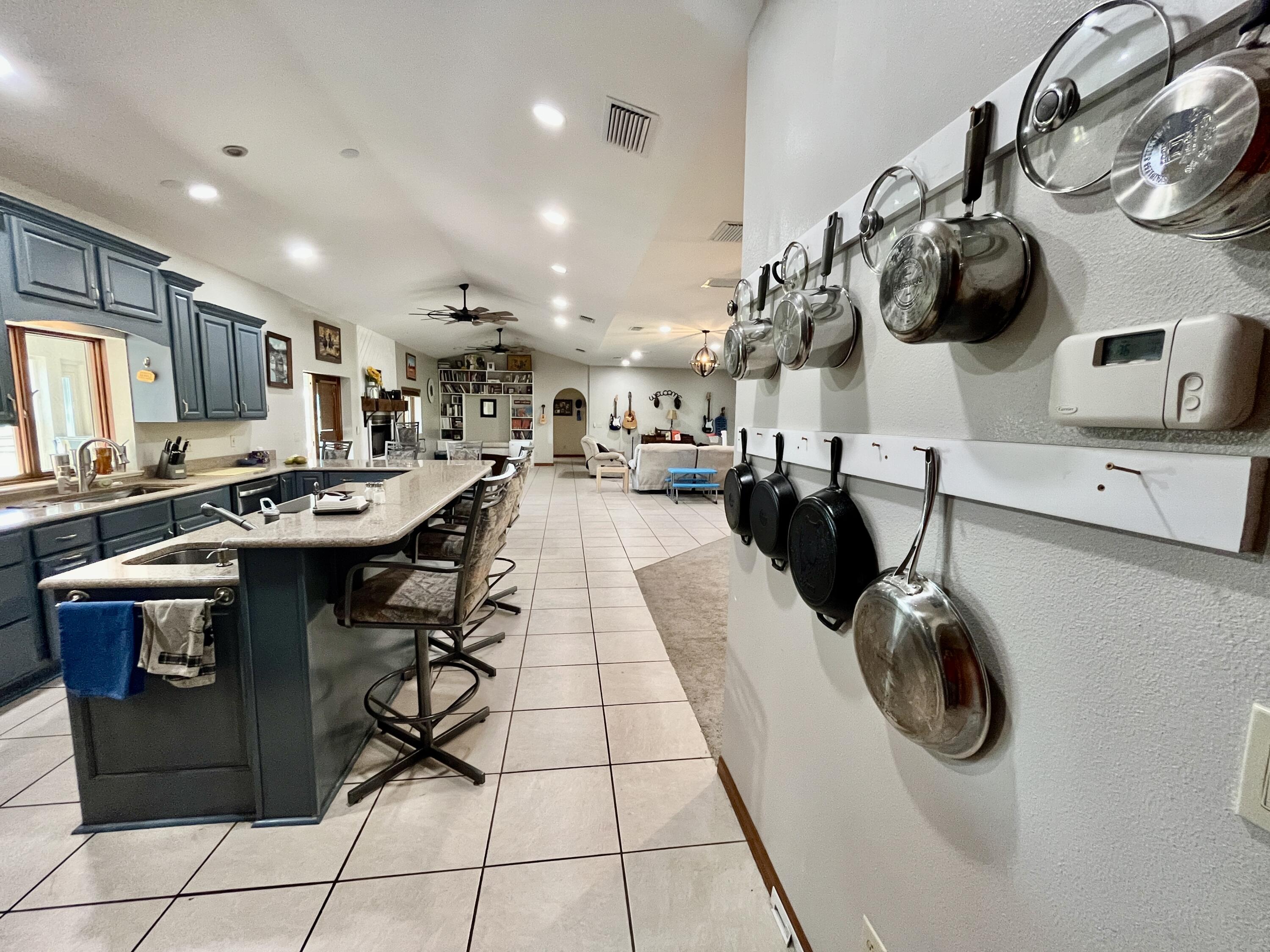 3046 North Bowden Road Avon Park, FL 33825 - Photo 3 of 41 a kitchen with stainless steel appliances granite countertop a sink a stove and cabinets