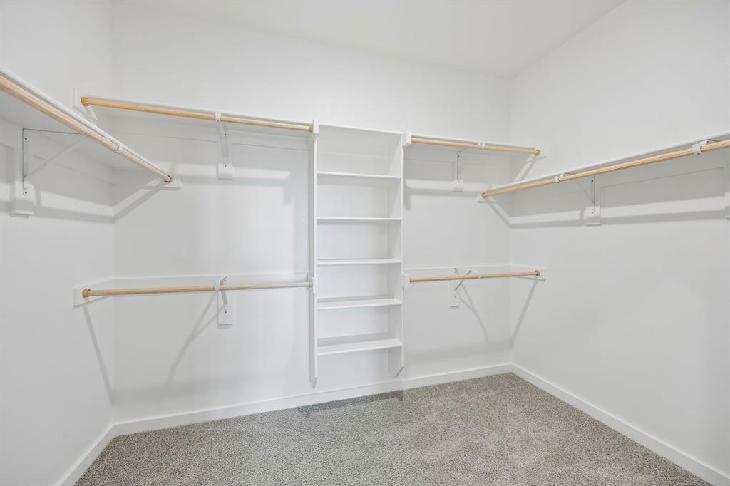332 Millwood Road Lavon, TX 75166 - Photo 19 of 32 Primary Closet in the Mesquite home plan by Trophy Signature Homes – REPRESENTATIVE PHOTO