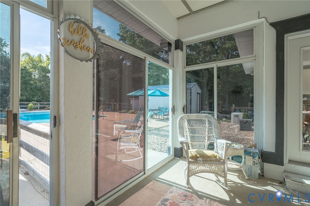 12700 Coalboro Road Chesterfield, VA 23838 - Photo 40 of 50 Screened porch with extensive window panels, concr