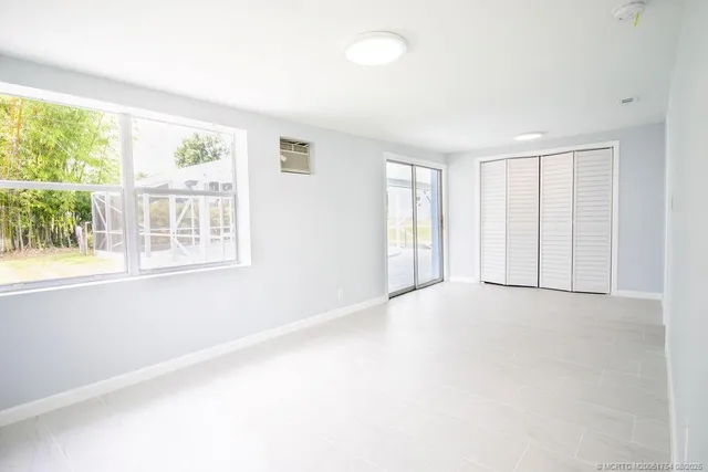 an empty room with windows