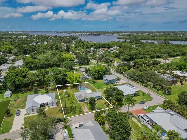 an aerial view of a house with a garden