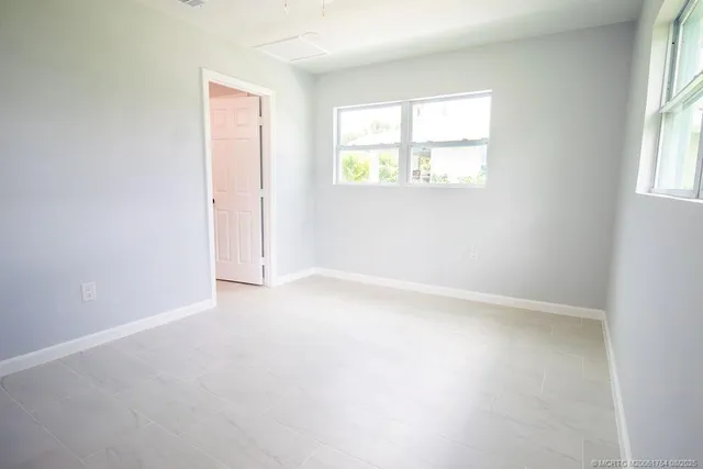 an empty room with windows