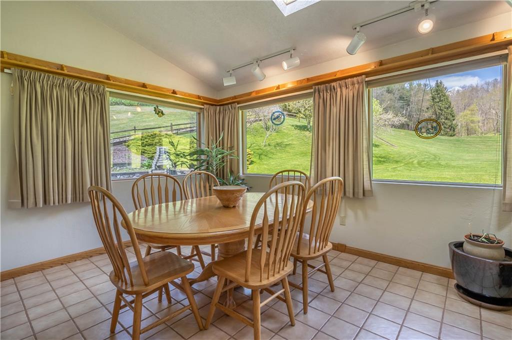 527 Claylick Road Holbrook, PA 15341 - Photo 11 of 24 a dining room with furniture window and outside view