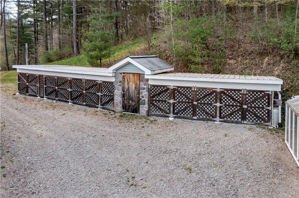 527 Claylick Road Holbrook, PA 15341 - Photo 16 of 24 a view of a house with a wooden fence