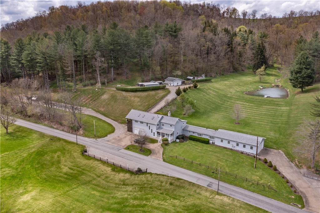 527 Claylick Road Holbrook, PA 15341 - Photo 2 of 24 a view of a lake with a yard