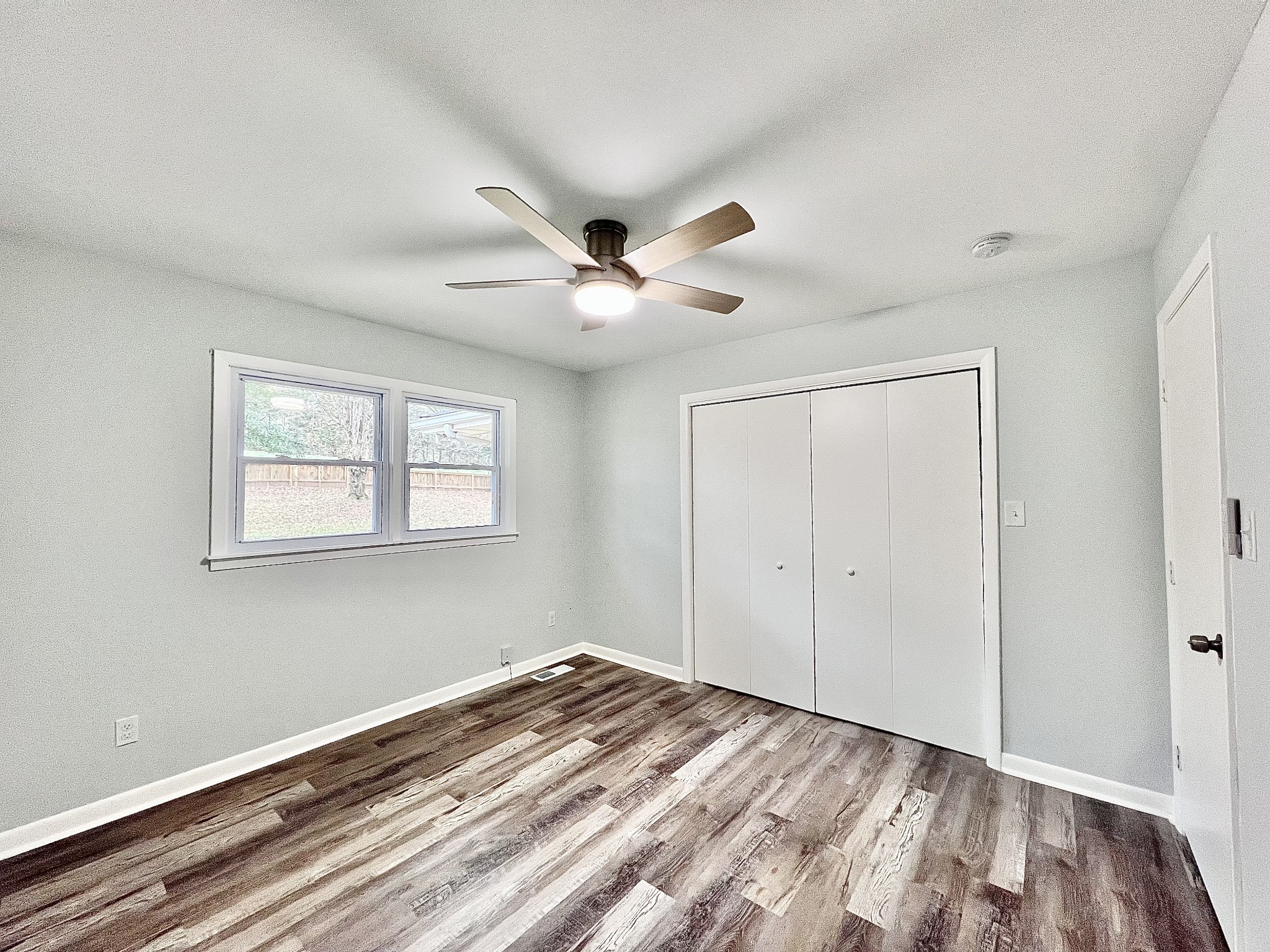 1595 Hurricane Creek Road Lawrenceburg, TN 38464 - Photo 25 of 74 a view of a livingroom with a ceiling fan and window