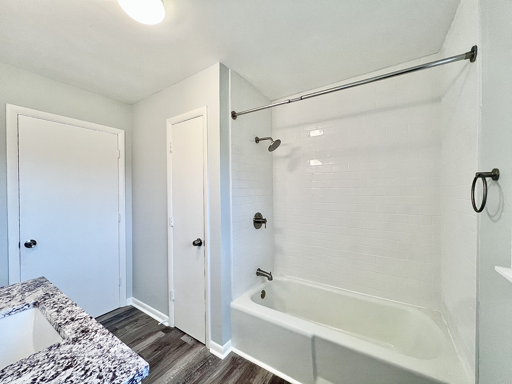 1595 Hurricane Creek Road Lawrenceburg, TN 38464 - Photo 31 of 74 a bathroom with a tub shower and a sink