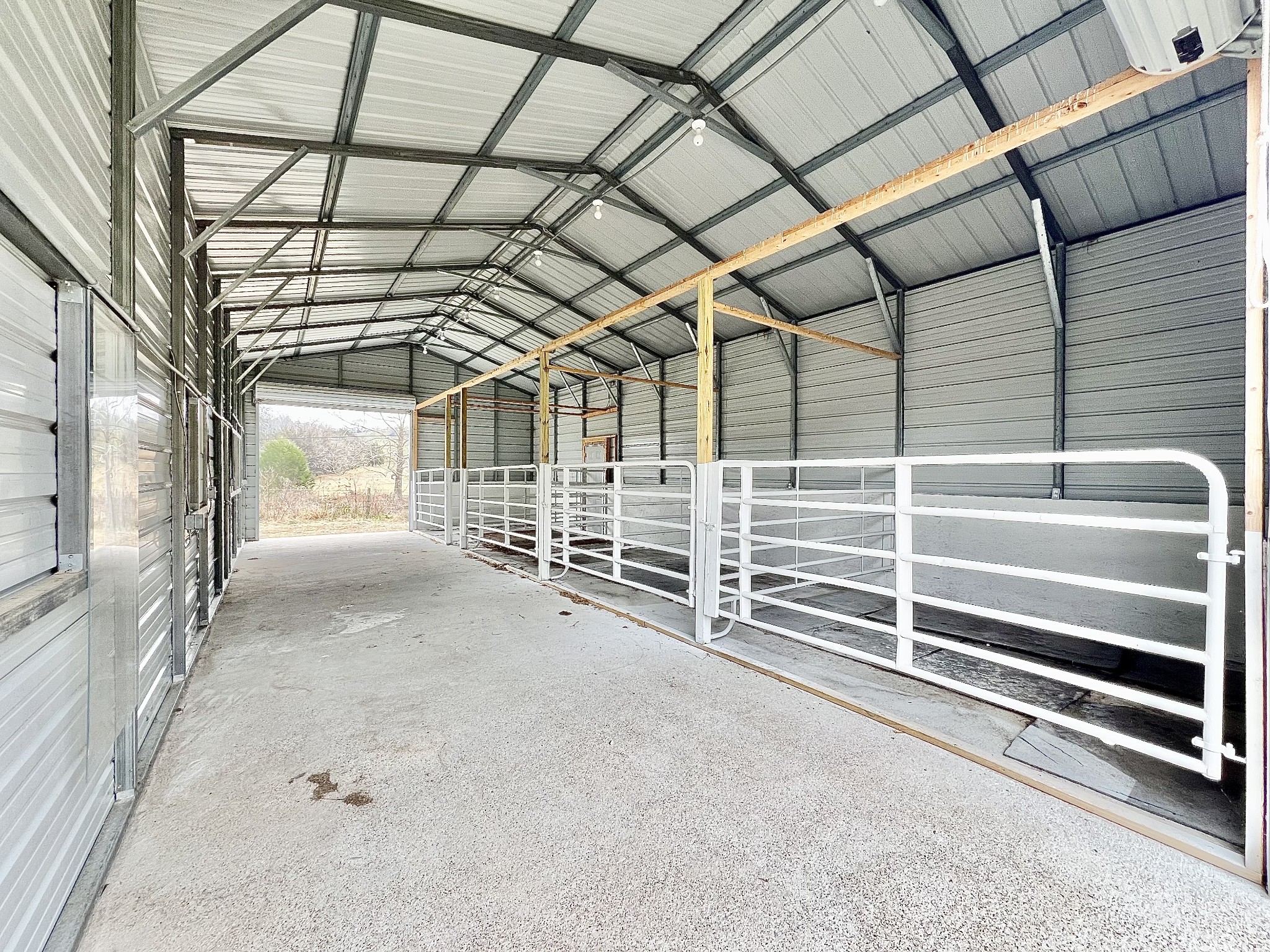 1595 Hurricane Creek Road Lawrenceburg, TN 38464 - Photo 7 of 74 a view of a room with racks on the wall