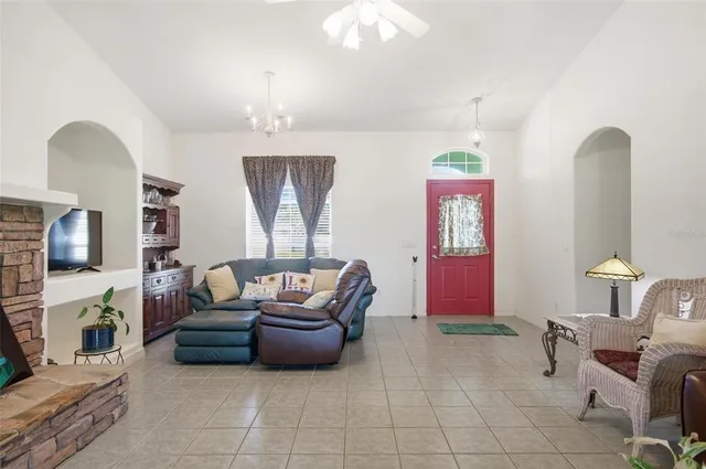 a view of a room with a table and chairs