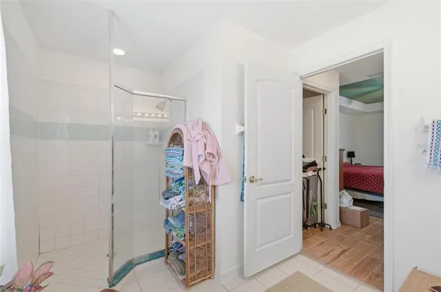 a kitchen with stainless steel appliances granite countertop a refrigerator sink and stove