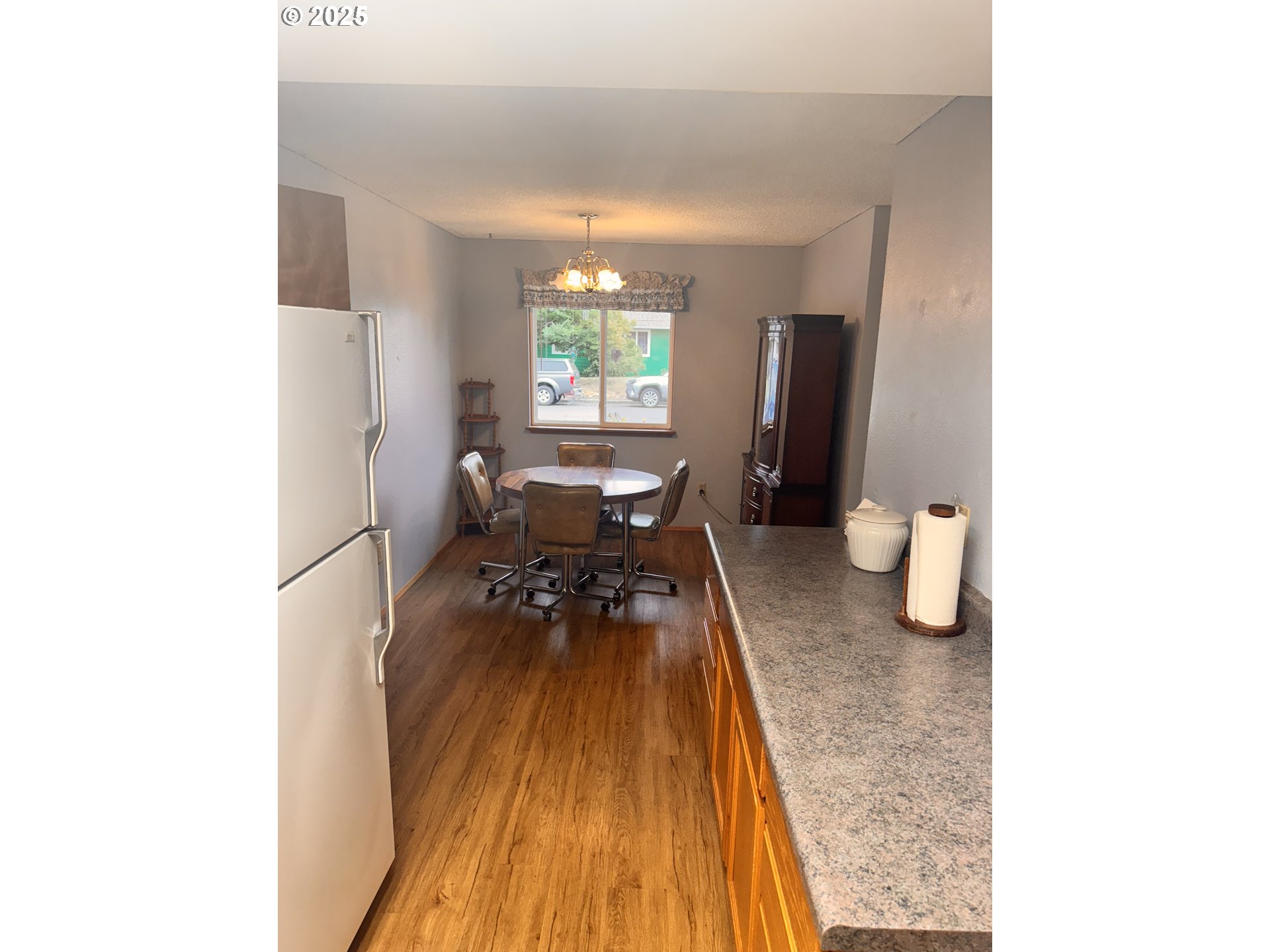 560 Maple Street Aumsville, OR 97325 - Photo 8 of 12 a living room with furniture and a wooden floor