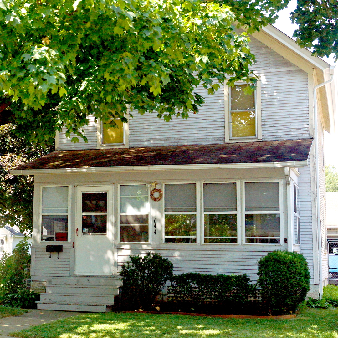 644 Wilder Street Aurora, IL 60506 - Photo 1 of 5 a front view of a house with a yard