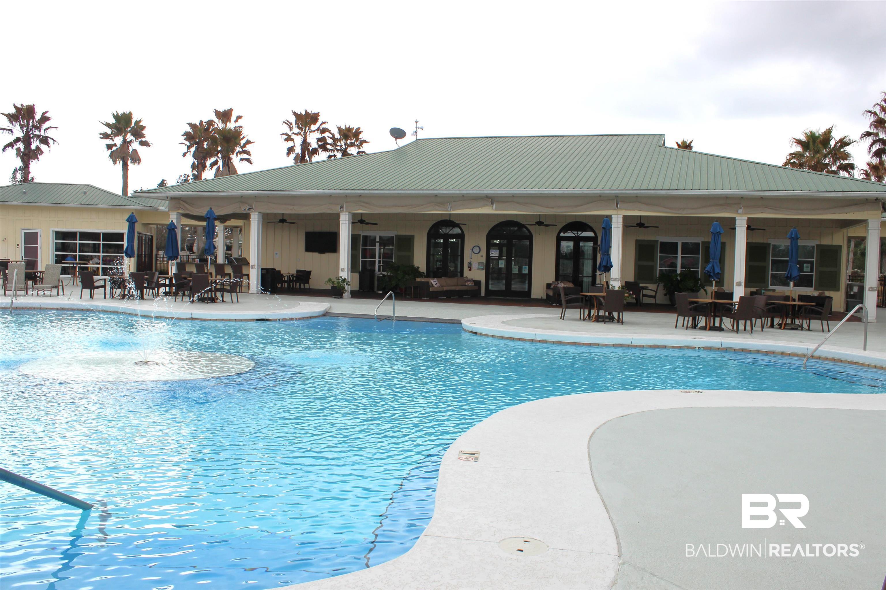 11993 Gateway Drive Elberta, AL 36530 - Photo 13 of 44 View of pool featuring a patio and ceiling fan