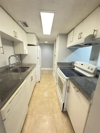 $245,000 | 4521 West McNab Road, Unit 11, Pompano Beach, FL 33069