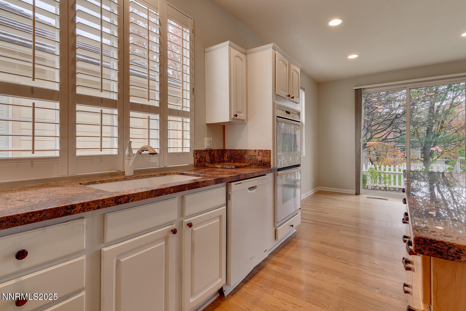 1150 Brookhollow Lane Reno, NV 89519 - Photo 13 of 30 a large kitchen with granite countertop a large window and a sink