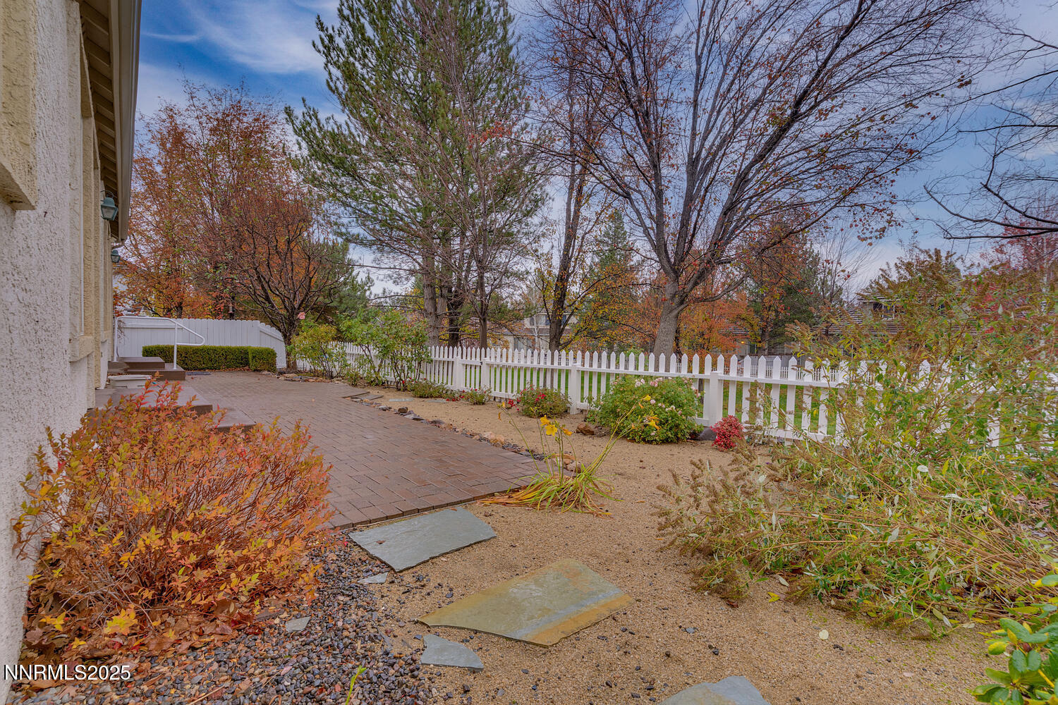 1150 Brookhollow Lane Reno, NV 89519 - Photo 19 of 30 a view of a backyard with a tree