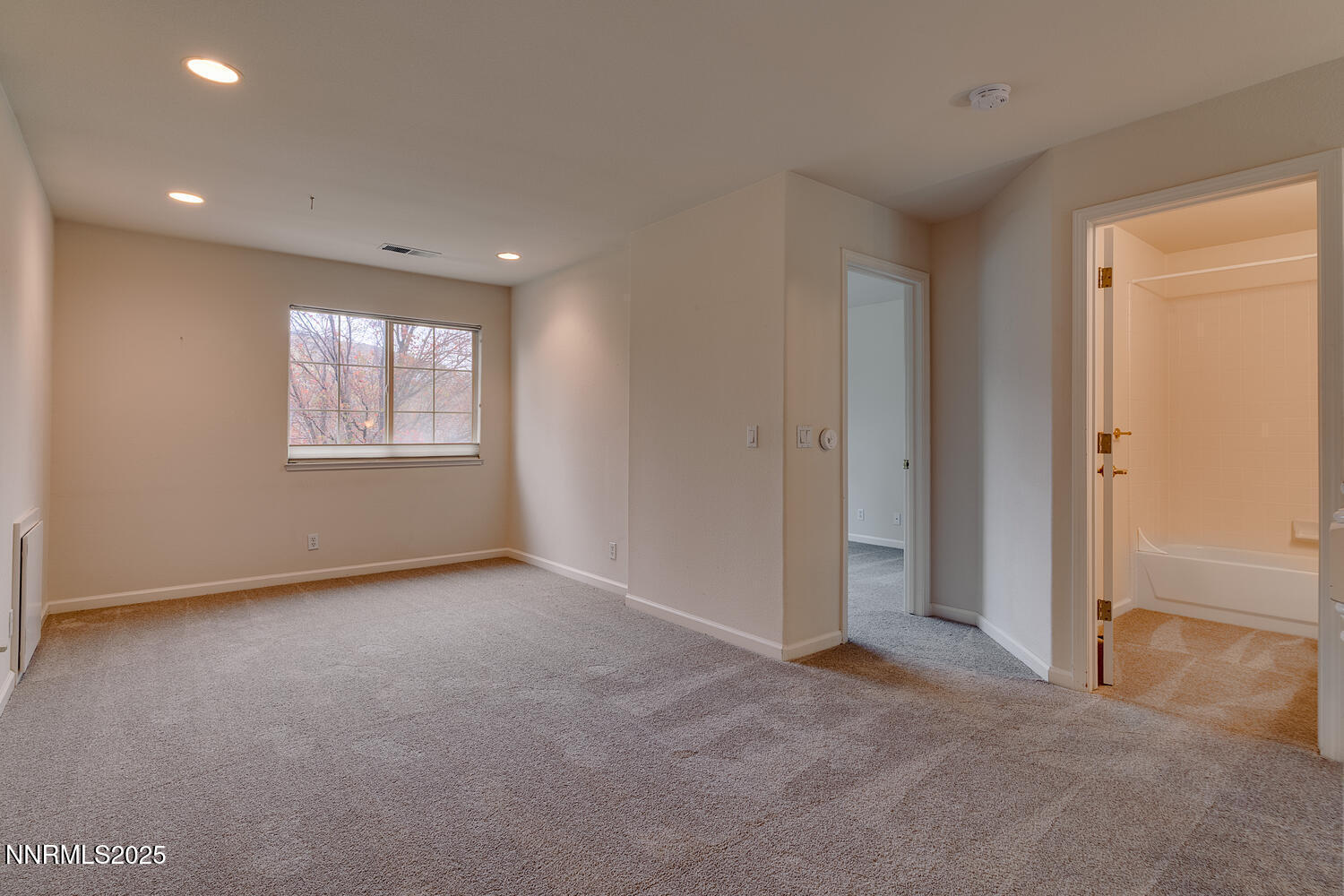 1150 Brookhollow Lane Reno, NV 89519 - Photo 28 of 30 an empty room with windows