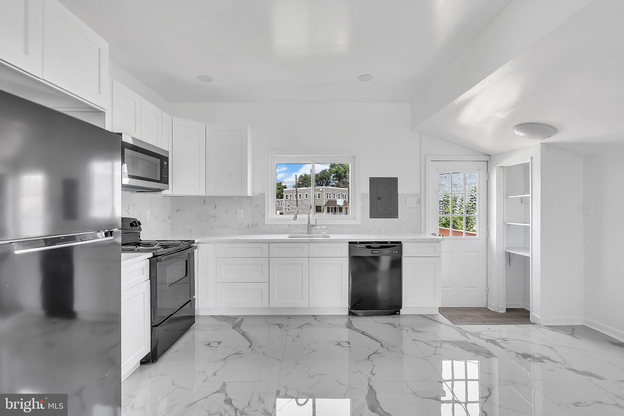 264 Birch Street Carneys Point, NJ 08069 - Photo 29 of 29 Modern kitchen with sleek finishes.