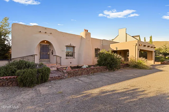 an aerial view of residential building with outdoor space and river view