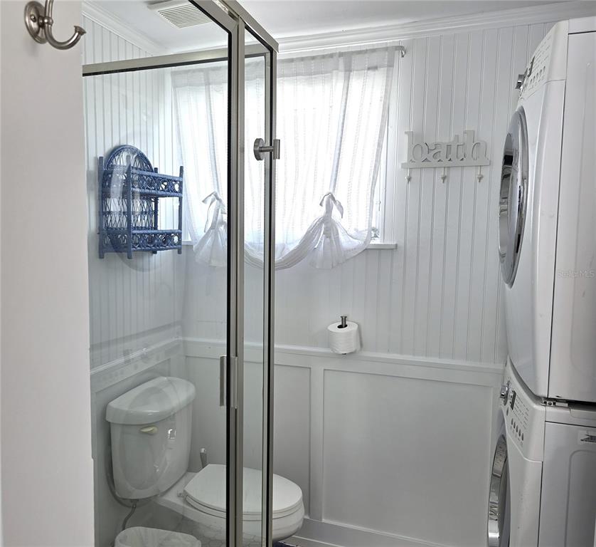 470 South McCall Road, Unit 11 Englewood, FL 34223 - Photo 17 of 22 a bathroom with a shower and a toilet