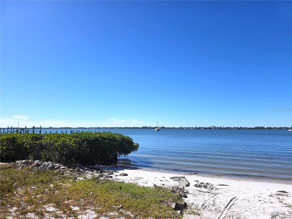 470 South McCall Road, Unit 11 Englewood, FL 34223 - Photo 6 of 22 a view of an ocean beach