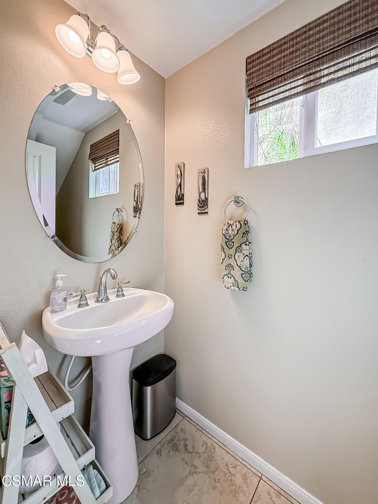 2968 Royal Avenue Simi Valley, CA 93065 - Photo 19 of 45 a bathroom with a sink and a mirror