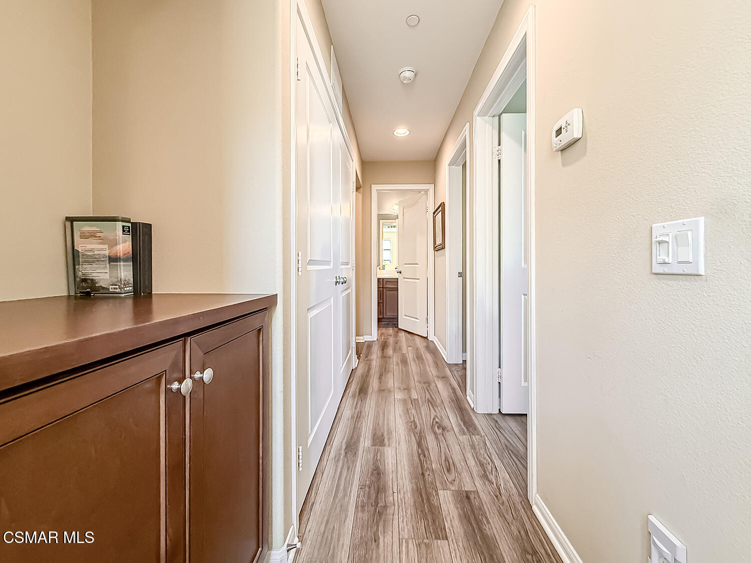2968 Royal Avenue Simi Valley, CA 93065 - Photo 20 of 45 a view of a hallway with wooden floor