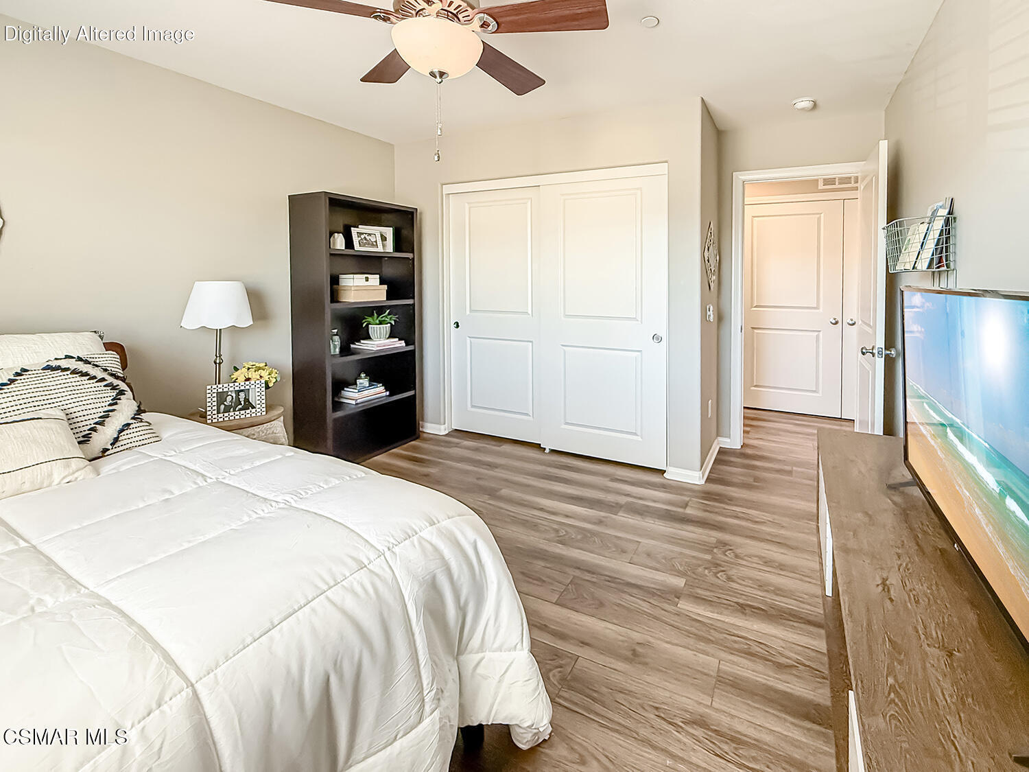 2968 Royal Avenue Simi Valley, CA 93065 - Photo 22 of 45 a bedroom with a bed and a flat tv screen on dresser
