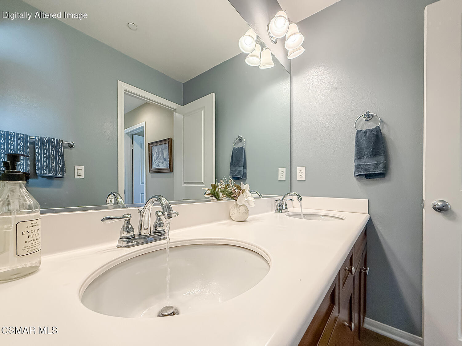 2968 Royal Avenue Simi Valley, CA 93065 - Photo 26 of 45 a bathroom with a sink and a mirror
