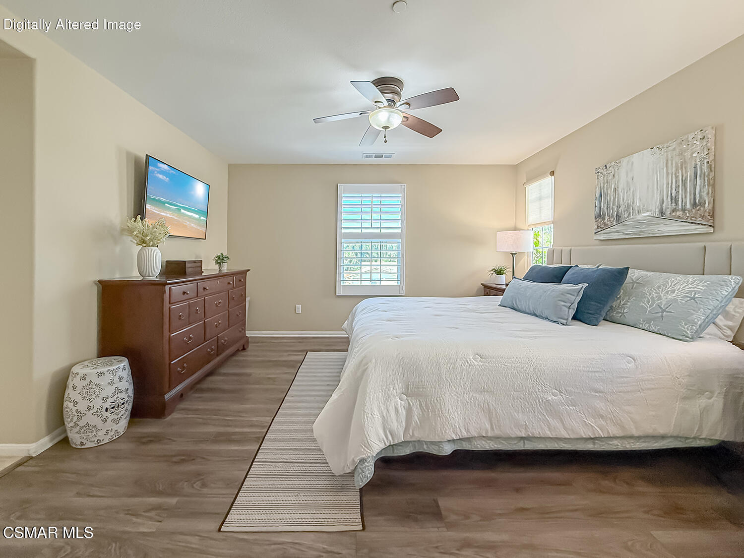 2968 Royal Avenue Simi Valley, CA 93065 - Photo 28 of 45 a bedroom with a bed and a chandelier