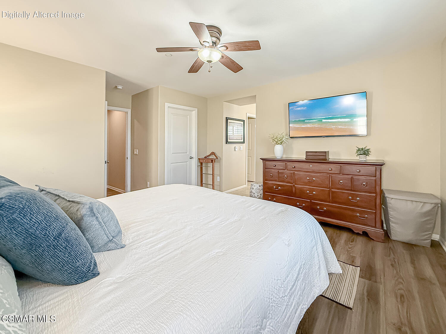 2968 Royal Avenue Simi Valley, CA 93065 - Photo 30 of 45 a bedroom with a bed and a flat screen tv