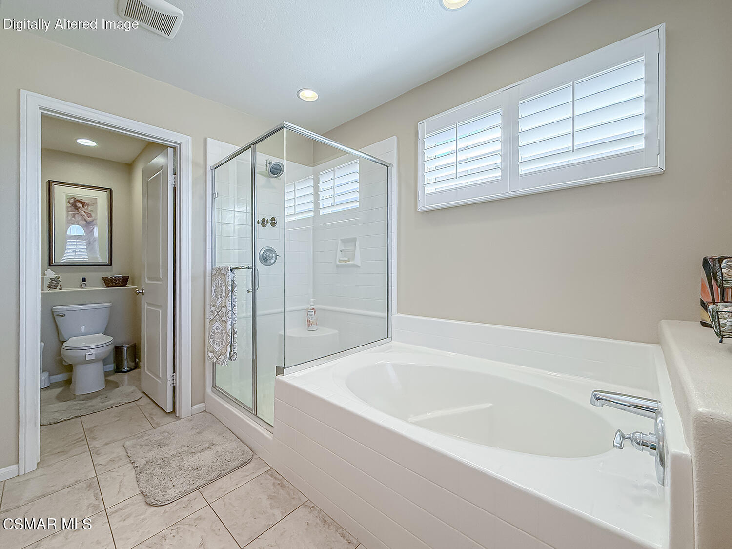 2968 Royal Avenue Simi Valley, CA 93065 - Photo 33 of 45 a spacious bathroom with a bathtub and a toilet