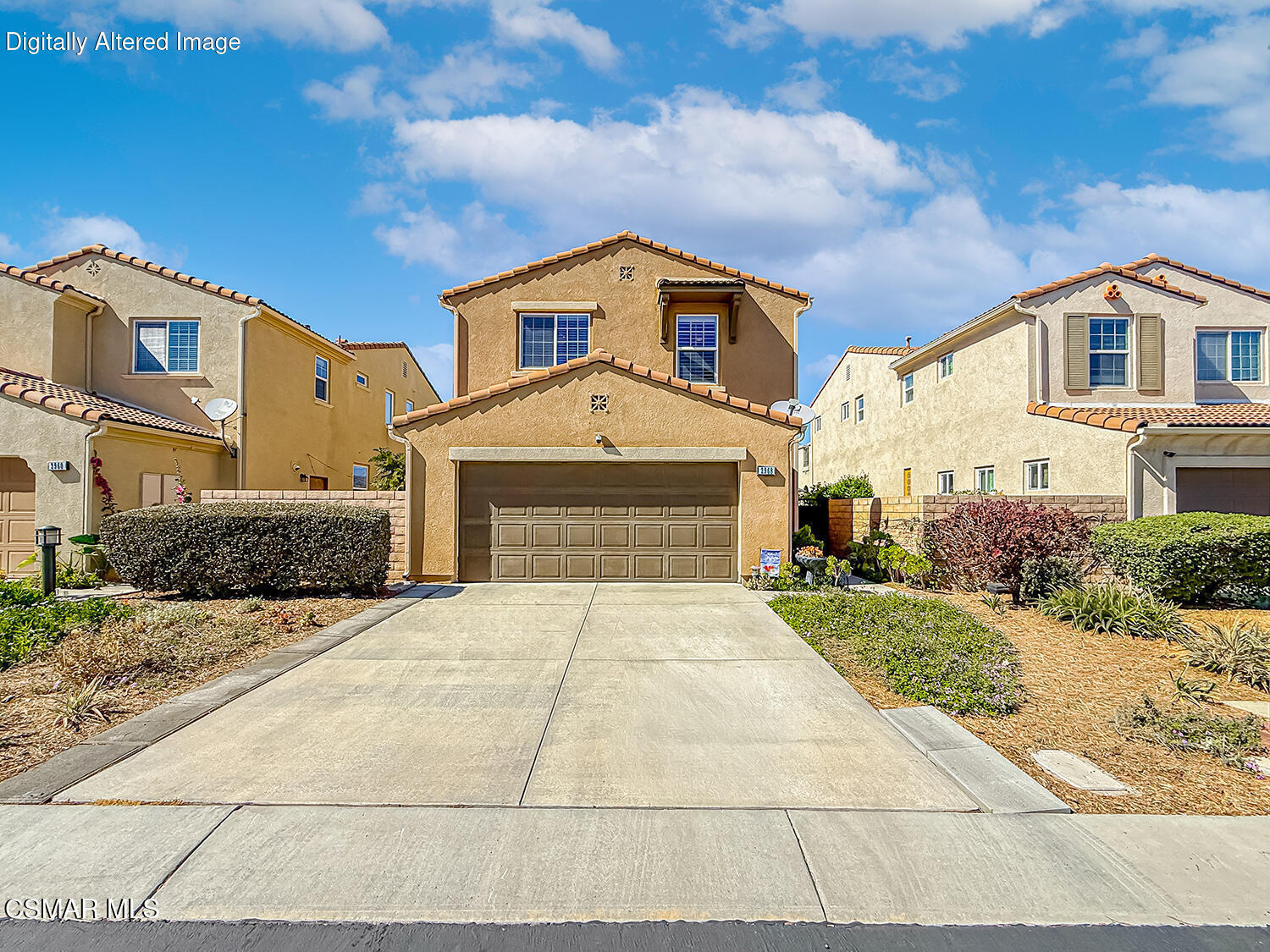 2968 Royal Avenue Simi Valley, CA 93065 - Photo 45 of 45 a front view of a house with a yard and garage