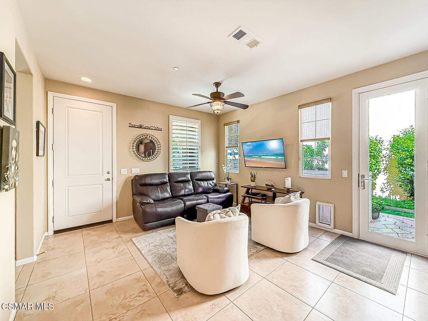 2968 Royal Avenue Simi Valley, CA 93065 - Photo 7 of 45 a living room with furniture a large window and chandelier