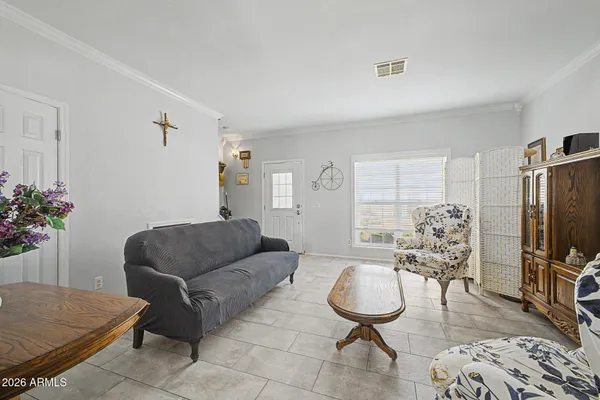 a picture of a bench in front of a wall