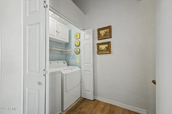 a kitchen with stainless steel appliances granite countertop a sink and a stove