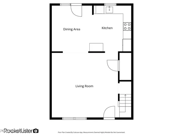a living room with furniture a fireplace and a window