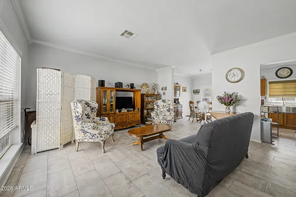 a front view of house with yard and outdoor seating
