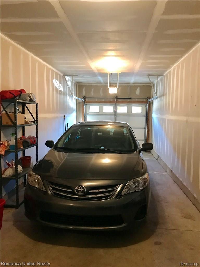 1109 Rial Lake Drive, Unit 47 Howell, MI 48843 - Photo 24 of 33 Large tandem 2 car garage