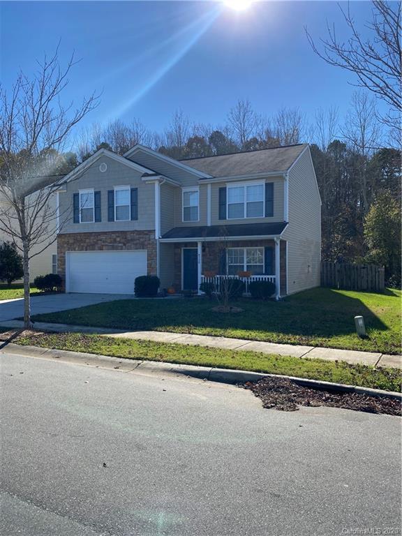 8720 Chalkstone Road Charlotte, NC 28216 - Photo 6 of 6 a front view of a house with a yard