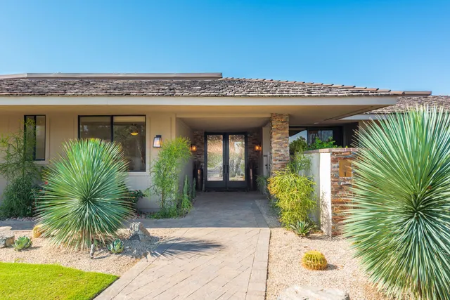 a view of a house with a patio
