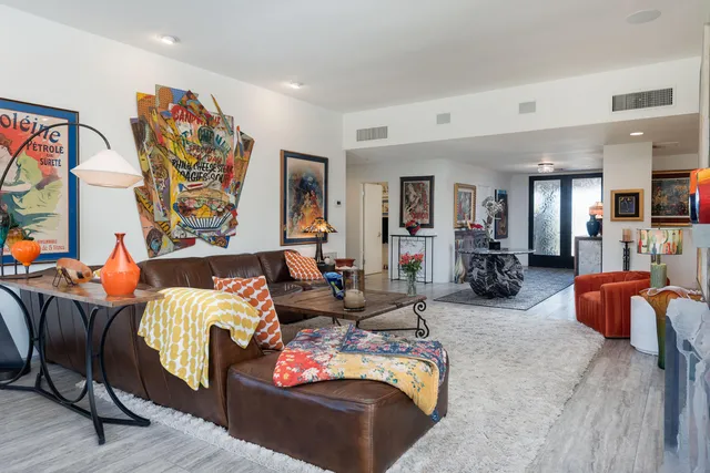 a bed room with furniture and a couch