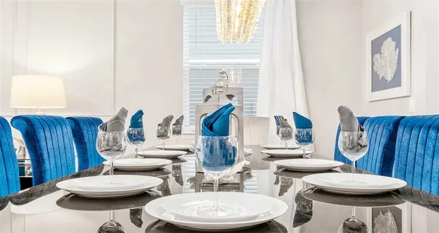 a bathroom with a toilet a sink and a mirror