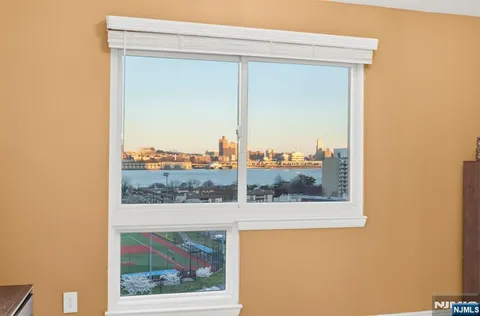 a view of a room that has a window in it
