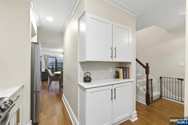 a kitchen with a stove and a microwave